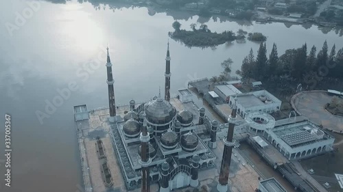 TERENGGANU, MALAYSIA - The Crystal Mosque or Masjid Kristal is a floating mosque in Kuala Terengganu, Terengganu, Malaysia. (aerial view)