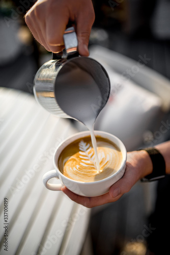 Coffee latte art at sunny day