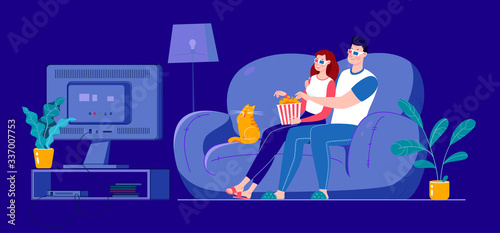 A married couple is watching a 3D movie on a large screen, sitting on a sofa at home in a dark room. Self-isolation at home.