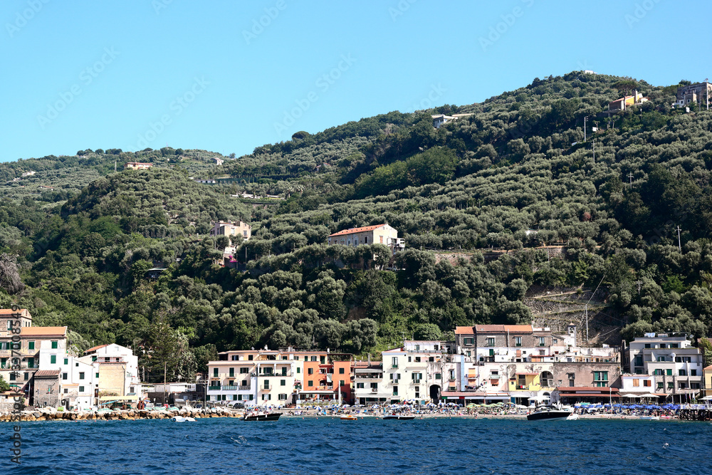 Italy- View of town and beach on the Sorrentine Peninsula coastline.