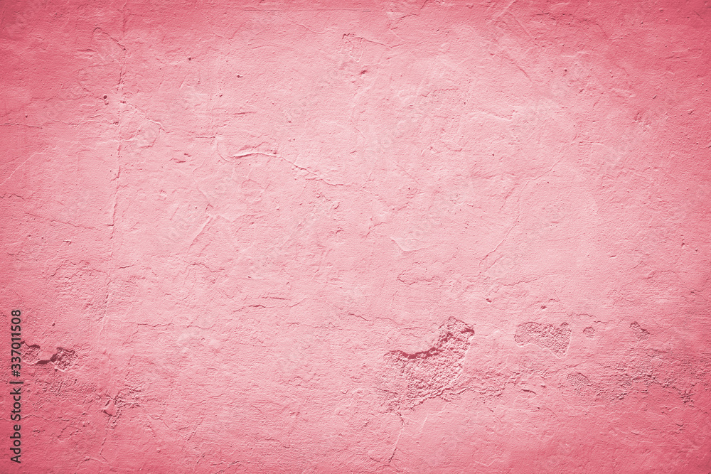 Fototapeta premium Red background with vignette effect. Pastel red wall with embossed surface.