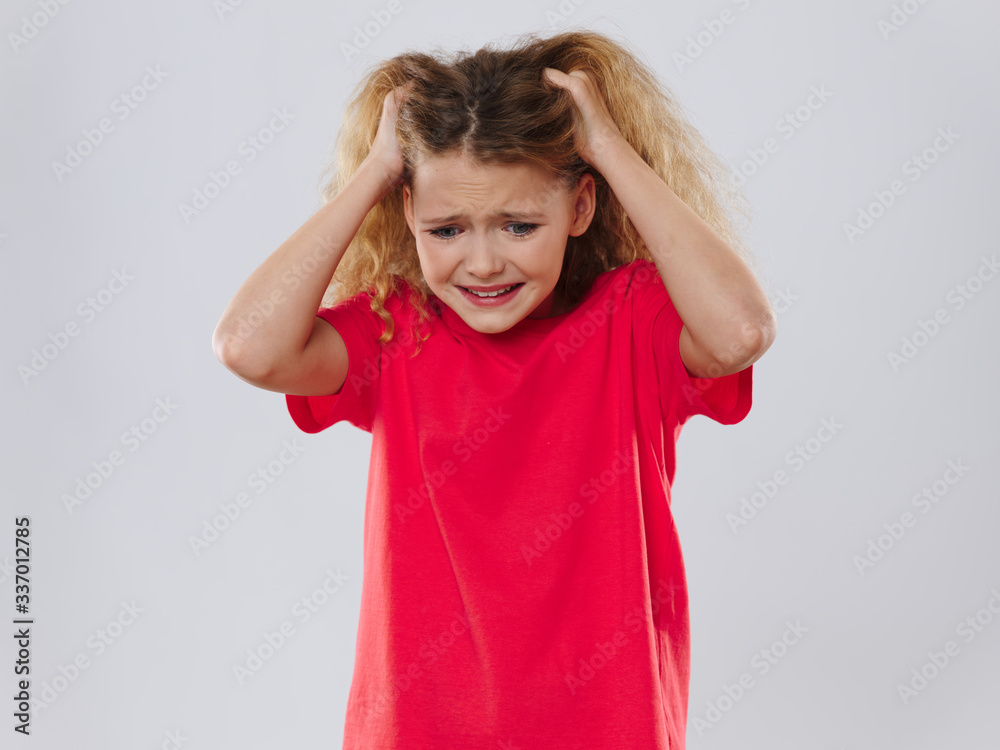 portrait of a little girl with a headache portrait of a little girl with a headache