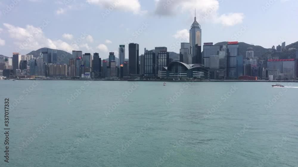Hong Kong / China Mar 22 2020: Ferries, sails, boats in Victoria Harbour, Hong Kong Hong Kong / China Mar 22 2020: Ferries, sails, boats in Victoria Harbour, Hong Kong