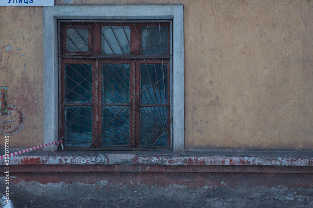 Fototapeta premium destroyed old Soviet apartment buildings in the city