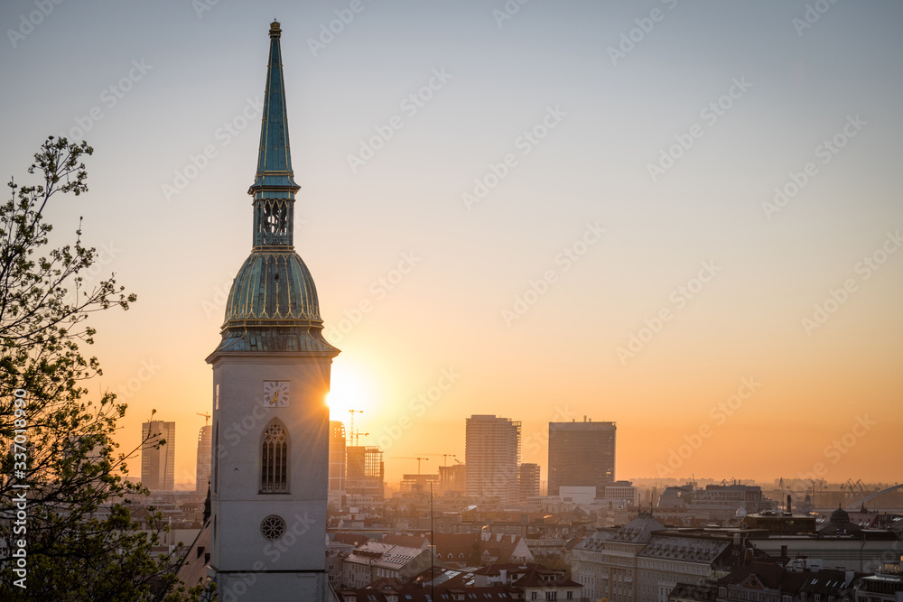 Cityscape of Bratislava at dawn with St. Martin's Cathedral in front, Slovakia