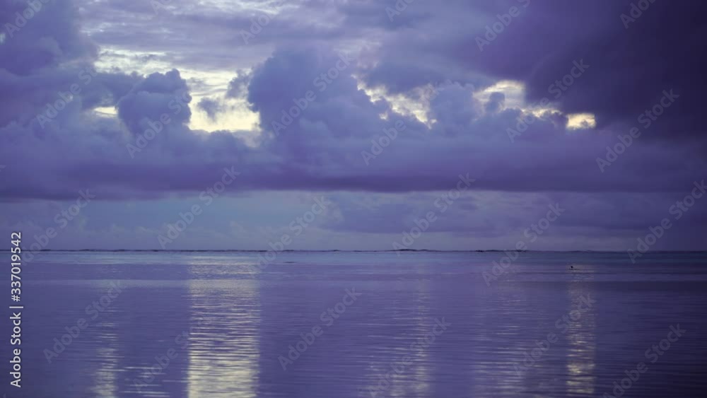 Cloudy sky before rain during sunrise and sea water on Zanzibar Island, Tanzania, East Africa Cloudy sky before rain during sunrise and sea water on Zanzibar Island, Tanzania, East Africa