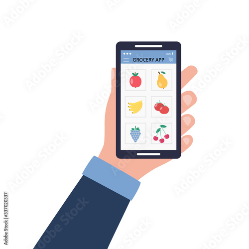 Online grocery apps. A man buys food online. Male hand holds a smartphone with the application. Fruits, vegetables, product basket. Vector illustration on a white background