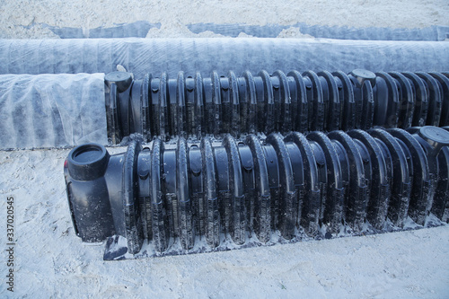 leaching chamber or sewerage
septic field leaching under construction. Groundwater pipe plan. treatment facilities