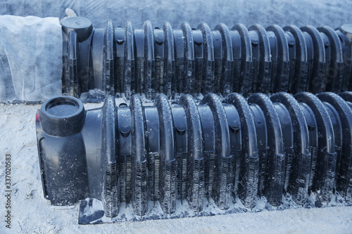 sewage system
septic leach field under constructions or
leachfield chamber. Pattern of groundwater pipe. Close-up photo
