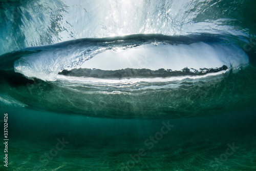Fototapeta Naklejka Na Ścianę i Meble -  underwater view of wave barreling 