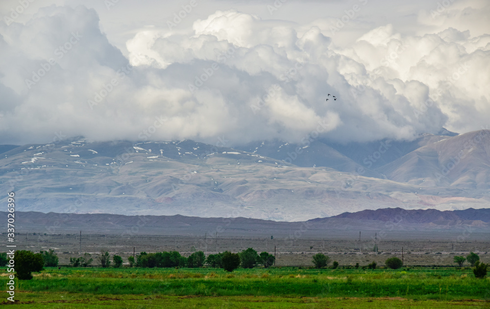 Central part Tien Shan mountain landscape with clouds