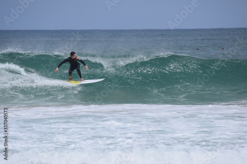 A surfer catching a tube in Bali