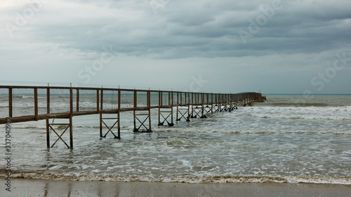Seascape with the sea and pier