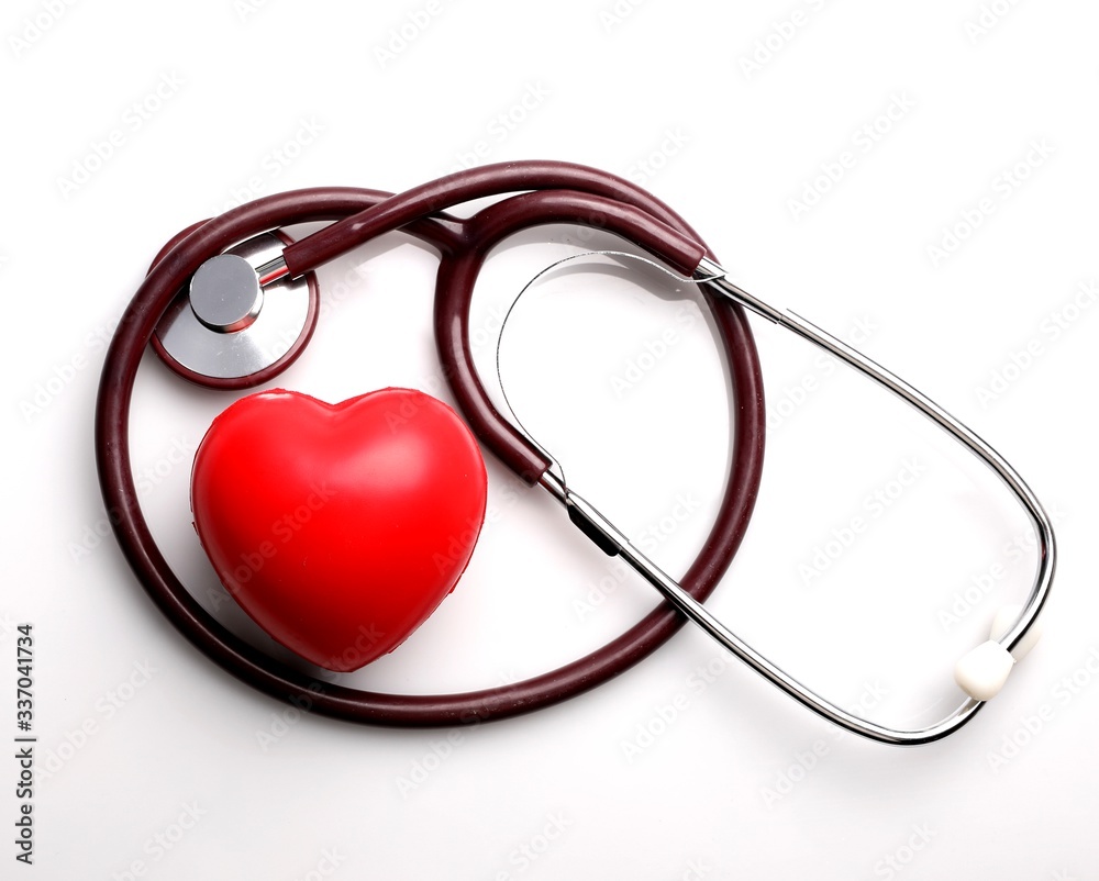 Healthcare concept. A stethoscope and red heart isolated on white. Healthcare concept. A stethoscope and red heart isolated on white.