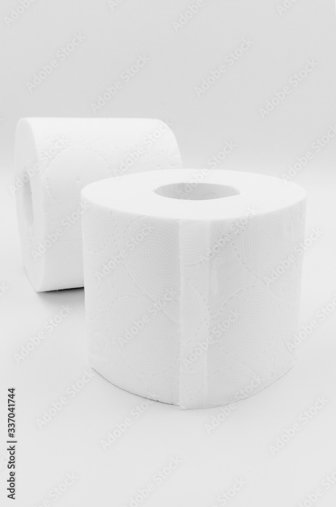 White toilet paper, rolled, on white background White toilet paper, rolled, on white background