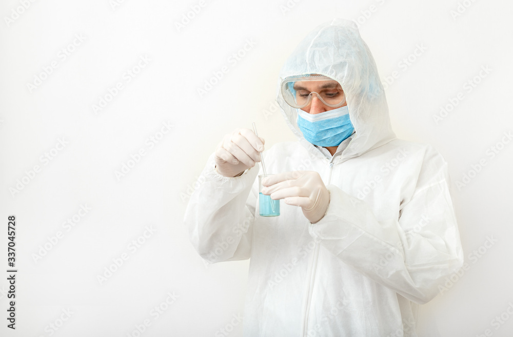 Coronavirus, covid-19. Doctor or scientist in protective medical suit, biological hazard, face mask creating vaccine in laboratory on white background. Medical healthcare pandemic prevention concept. Coronavirus, covid-19. Doctor or scientist in protective medical suit, biological hazard, face mask creating vaccine in laboratory on white background. Medical healthcare pandemic prevention concept.