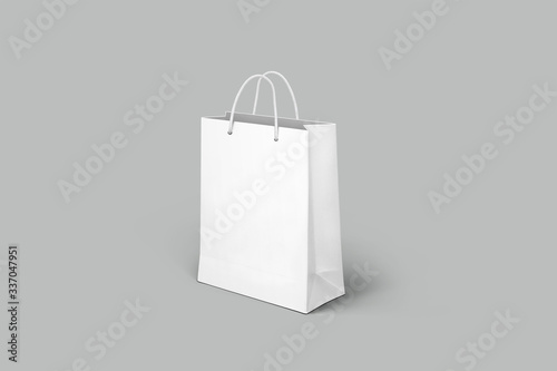 White paper bag mockup isolated on grey background.
