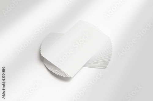 Blank horizontal business cards fan stack isolated on whiteas template for design presentation, branding, promotion etc. photo