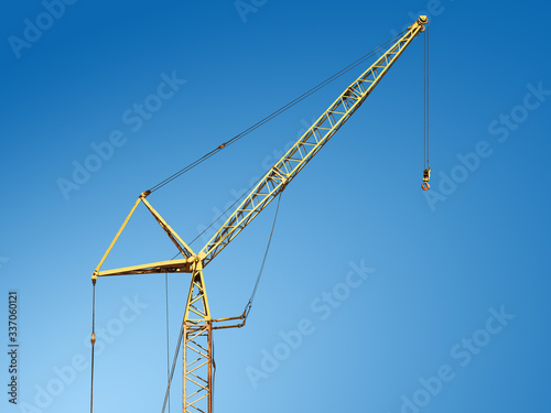 construction crane against blue sky