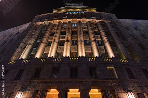 Low angle night shot of a colossal Post office building at the heart of Belgrade photo