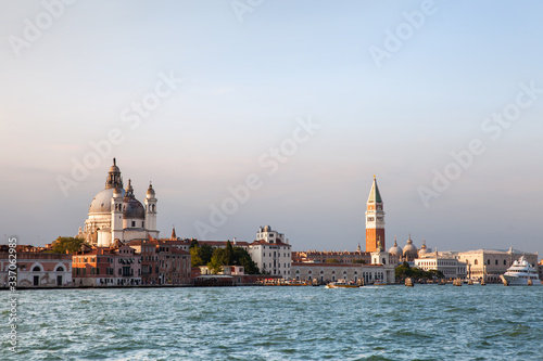 sunset on Grand canal and bell tower of San Marco, Venice