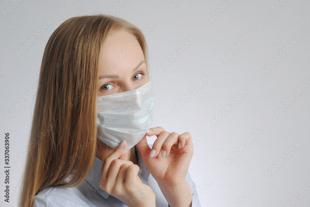 girl with medical mask. portrait of young woman. health protection poster concept. put and fit the mask theme girl with medical mask. portrait of young woman. health protection poster concept. put and fit the mask theme