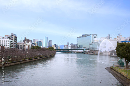 View of the city of Osaka from the Okawa river photo