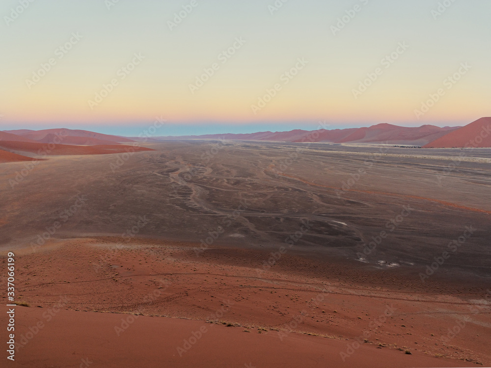 Sunrise view from Dune 45 in Sossusvlei area, southern part of the Namib Desert, Namibia Sunrise view from Dune 45 in Sossusvlei area, southern part of the Namib Desert, Namibia