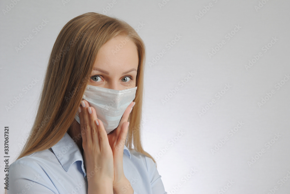 woman with medical mask. portrait of blonde girl. anxiety, excitement and fear of contracting a virus concept woman with medical mask. portrait of blonde girl. anxiety, excitement and fear of contracting a virus concept