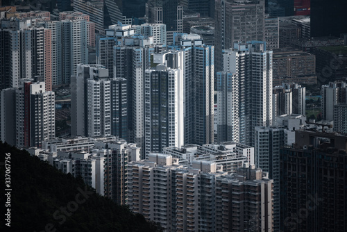 Hong Kong - March 26 2020   Hong Kong cityscape and skyscraper modern building  view from mountains of Hong Kong