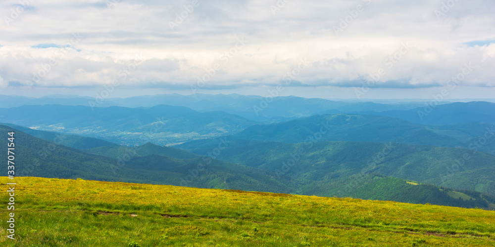 alpine scenery of carpathian mountains. stunning views on a windy summer day. clouds on the sky. ridges and valleys in the distance
