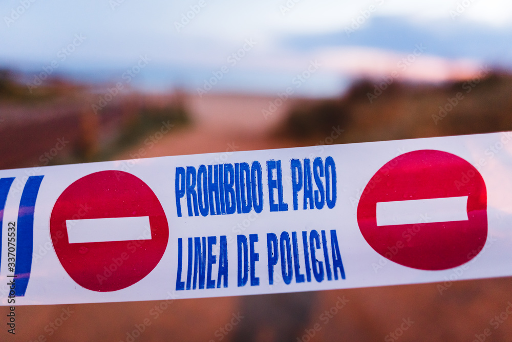 Police line with background blur effect. Quarantined public area, beach ...
