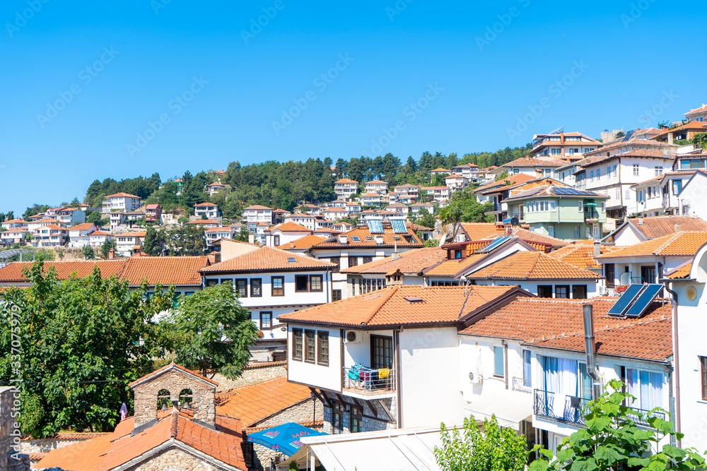 Red-tiled roofs of Ohrid. Beautiful city of North Macedonia which is known for amazing lake and UNESCO WHS. August 2019