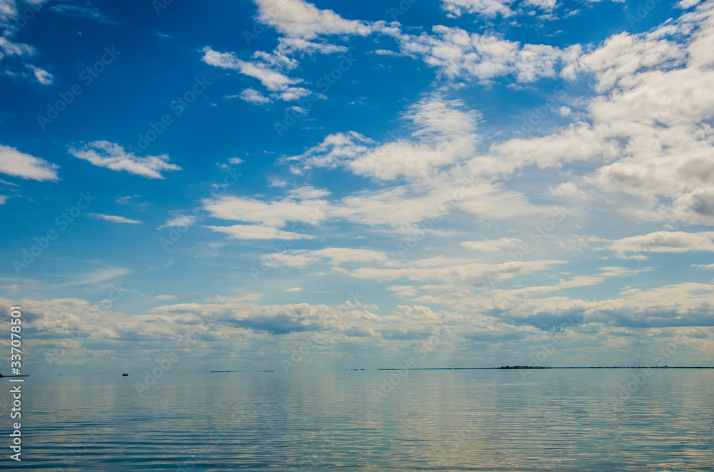Blue sea and sunny sky with clouds Blue sea and sunny sky with clouds