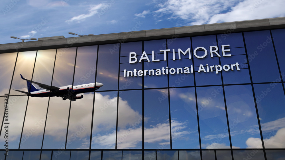 Obraz premium Airplane landing at Baltimore mirrored in terminal