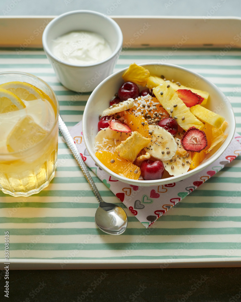 Bowl of fruit salad on a breakfast tray. Stock photo Bowl of fruit salad on a breakfast tray. Stock photo