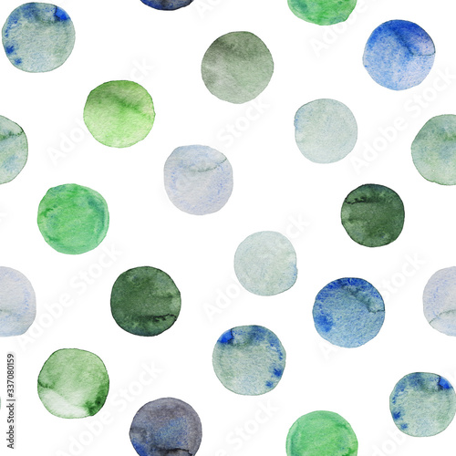 Seamless pattern of green and blue watercolor circles. Hand painted Spots on a white background. Round. Isolated. Blobs of different colors