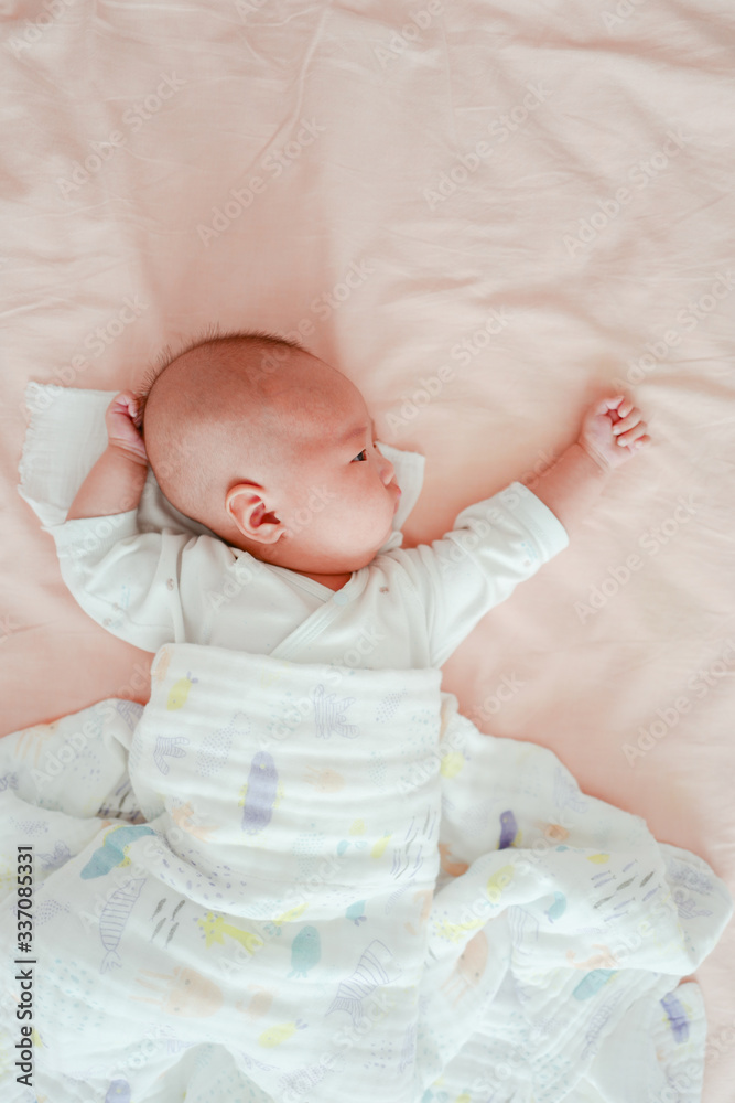 Baby sleeping in bed in the summer Baby sleeping in bed in the summer