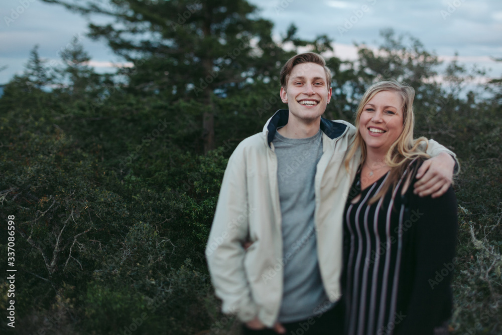 Mother and teenage son outside together Mother and teenage son outside together