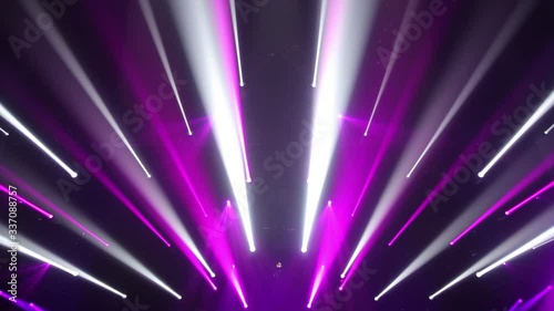 Stage Ray Of Light In Concert Hall. Lighting lamp rays shiny dynamic effect. Laser lights on the stage.  Professional lighting and show effects.Professional lighting and show effects.