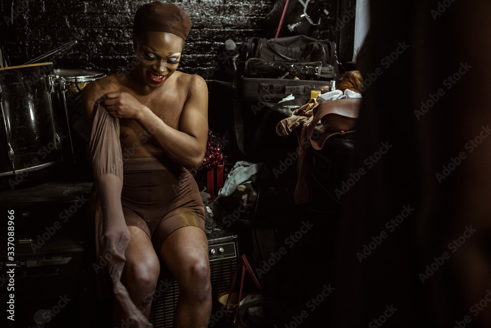 Drag Queens Putting On Layers of Stockings and Pantyhose Stock