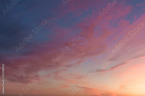 Evening Colorful Sky with Clouds. Sweet Heaven. Purple Texture. Abstract Background. Pastel Pink Color. Golden Hours Sky. Nature Wallpaper. Beautiful Sunset or Sunrise. Scenic Morning. Gradient © Komarov Dmitriy