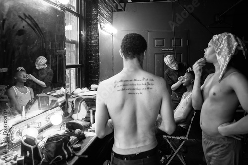 Drag Queens Applying Make-up in Backstage Dressing Room