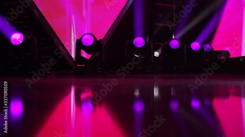 Purple lights from above soft optical lens flares shiny animation. Stage Ray Of Light In Concert Hall. Professional lighting and show effects. 