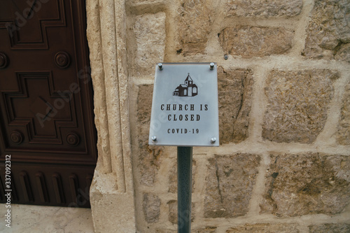 Church is closed sign. Cancellation of church services because of coronavirus outbreak. Church and Religion affected by COVID-19. Quarantined Easter, stay home concept