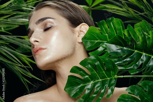 beautiful woman green leaves charm cosmetics