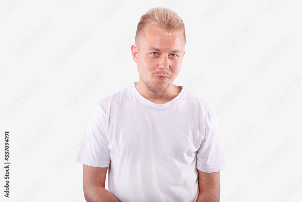 Manbrazenly playfully looks at camera. Isolated on white background Manbrazenly playfully looks at camera. Isolated on white background