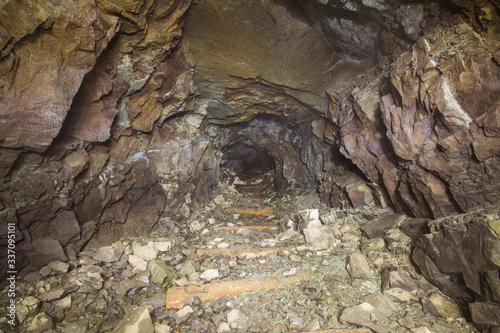 Underground abandoned platinum ore mine tunnel