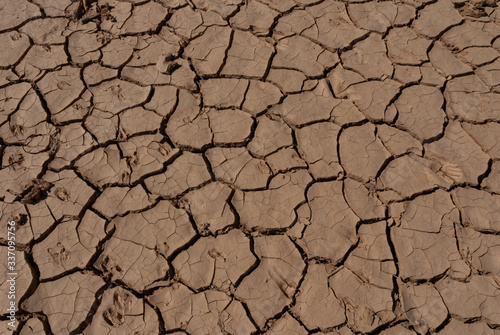 Desert dry and cracked ground, Chad. Africa