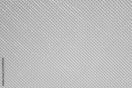 Abstract gray rhombus textured pattern. Close-up gray geometric pattern.
